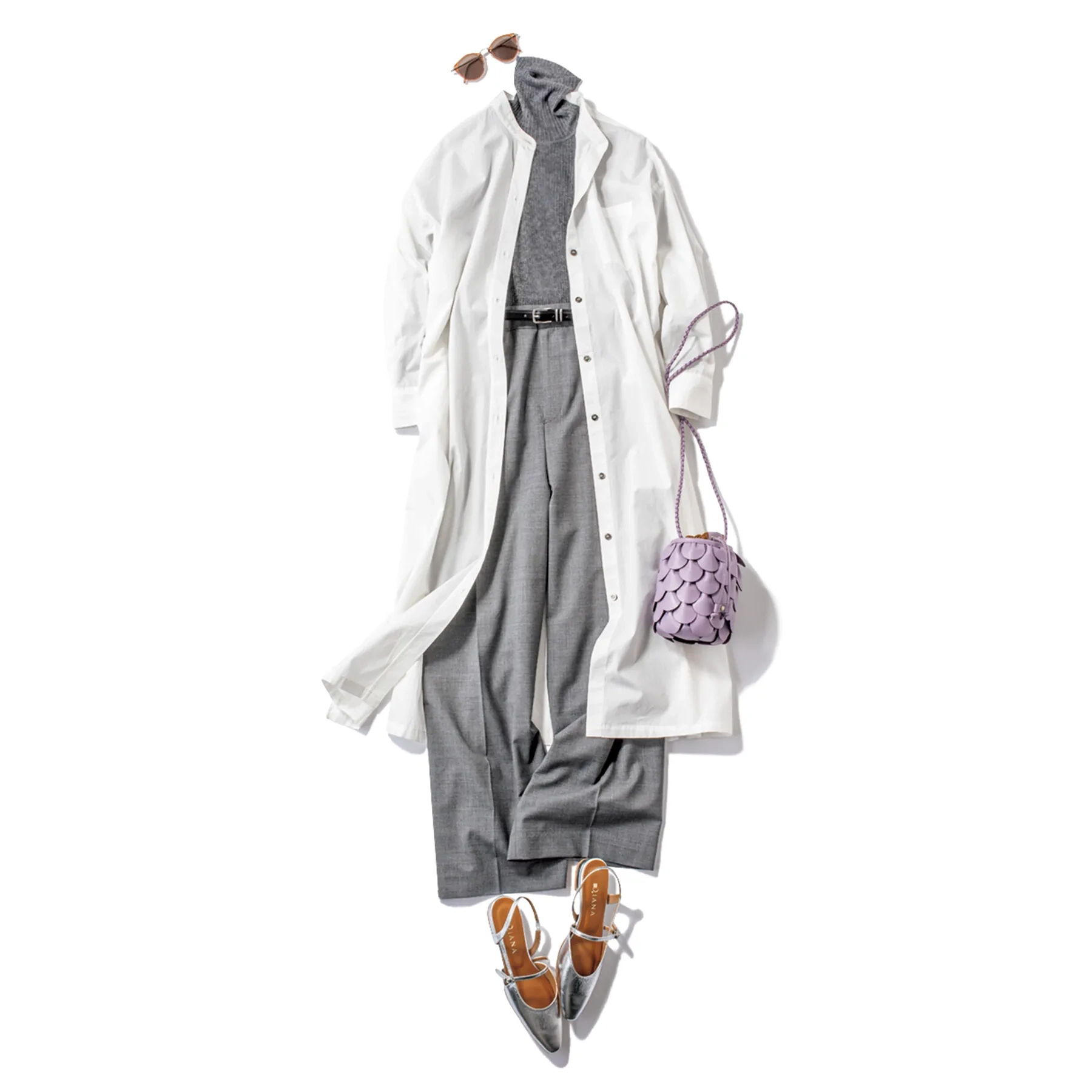 白のシャツワンピース、グレーのニット、グレーパンツ、シルバーシューズを合わせたコーデ