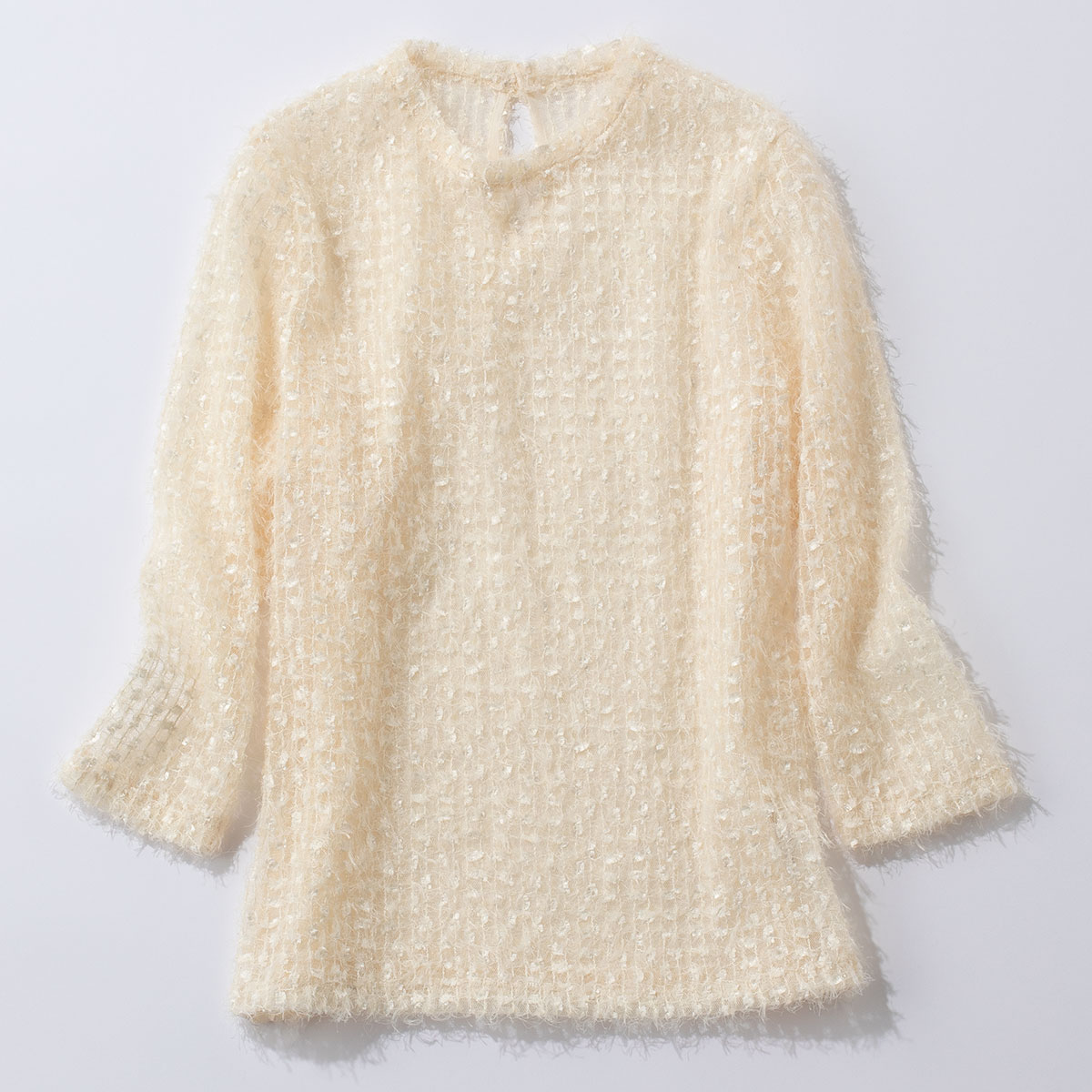 スパンコールのチュールブラウス