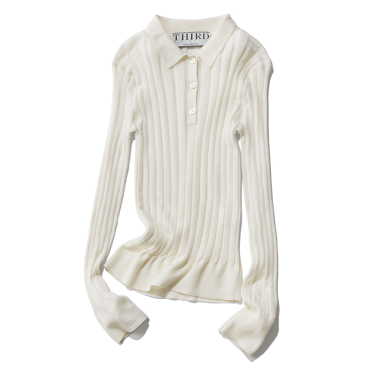 タイトラインの白ニットポロ