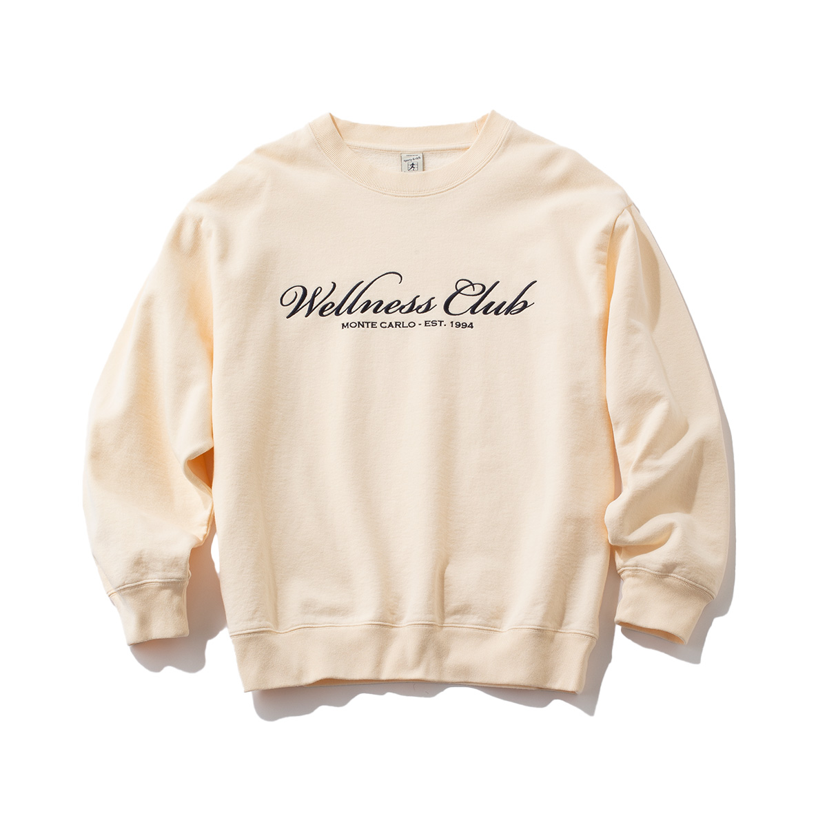 生成り色のロゴスウェットトップス