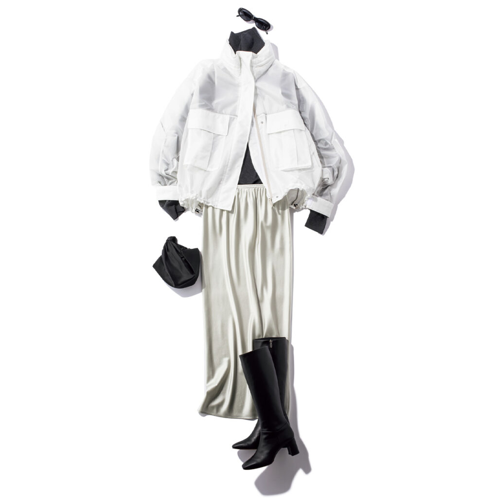 Iラインシルエットのサテンスカートに白ブルゾンのコーデ