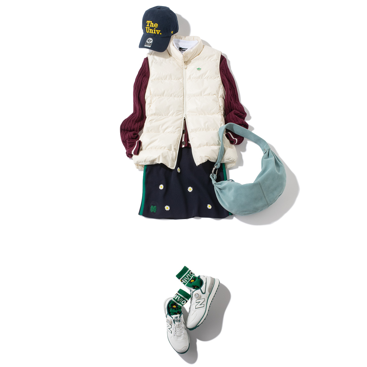 カーディガンと白ダウンベストのゴルフコーデ